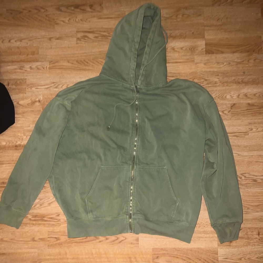 Matcha green John Galt/Brandy Melville zip up hoodie, has a few signs of wear